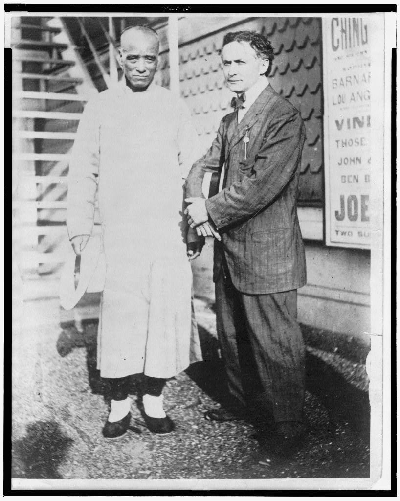 Ching Ling Foo and Harry Houdini standing together in a historical photograph in 1912